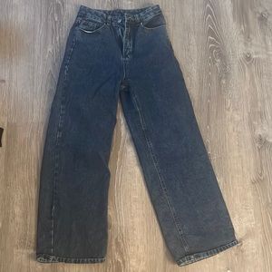 Woman’s baggy jeans